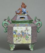 A Chinese porcelain vase Of octagonal form, the removable lid with dog-of-fo finial,