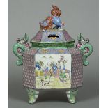 A Chinese porcelain vase Of octagonal form, the removable lid with dog-of-fo finial,