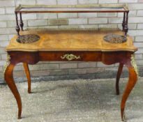 A 19th century inlaid walnut bureau plat The three quarter galleried mirror upper tier supported on