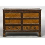 A George III painted pine mule chest The hinged rectangular top above the panelled front and two