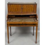 A 19th century satinwood and mahogany tambour fronted desk The three quarter brass galleried
