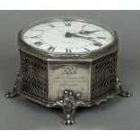 An unmarked silver cased desk timepiece The white enamelled dial with Roman and Arabic numerals