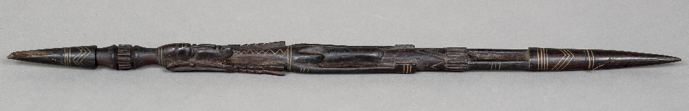 An African tribal Zulu chief's baton The hardwood carved figural staff with copper banded inlaid