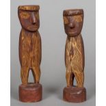 Two Eastern Arnhem Land Mokoy figures Both typically worked. The larger 21 cm high.