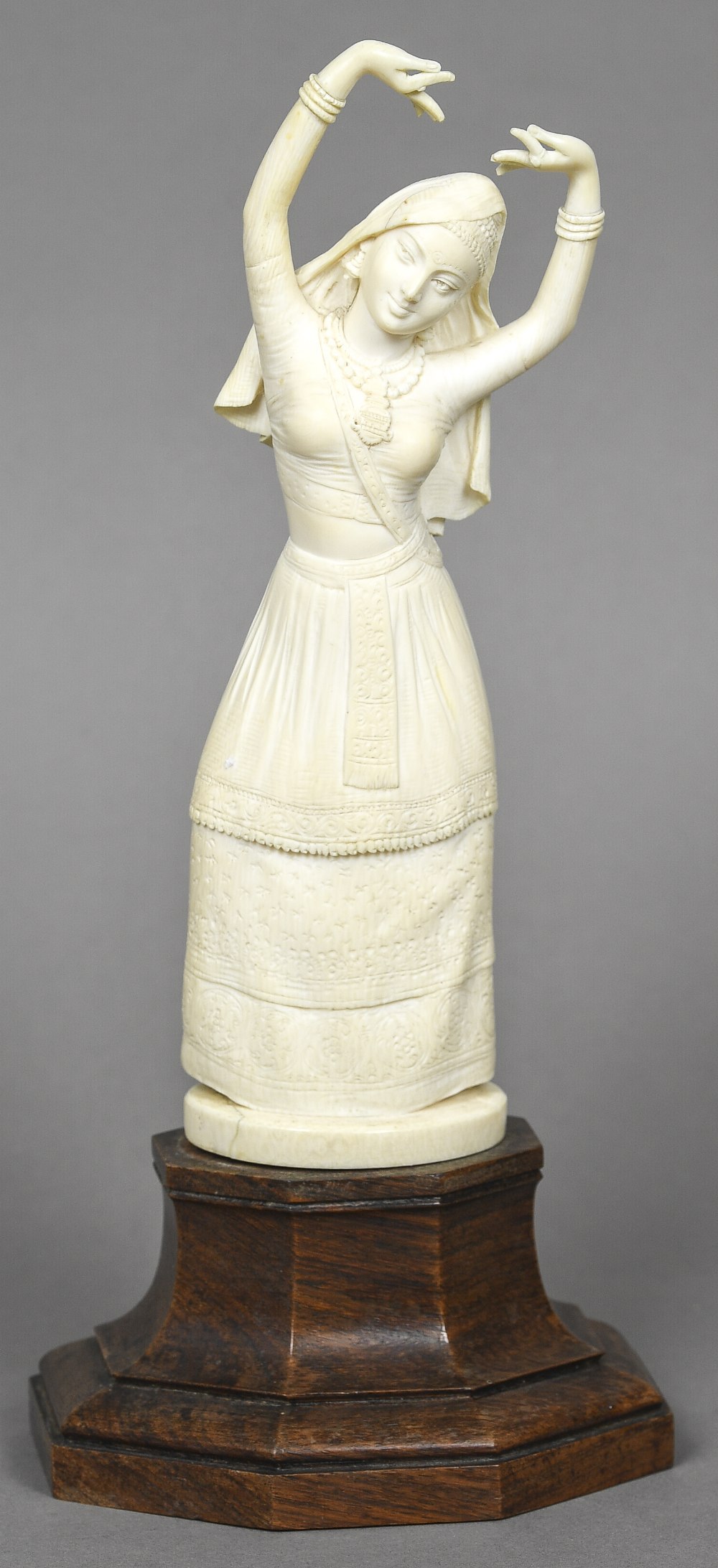 A late 19th/early 20th century Indian carved ivory figure Worked as a dancer,