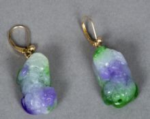 A pair of Chinese 14 K gold mounted apple green and lavender jade earrings Each carved as a