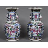 A pair of 19th century Canton famille rose vases Each with twin dog-of-fo handles and scrolling