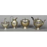 A late 18th century Dutch four piece silver tea set Comprising: teapot, cream jug,