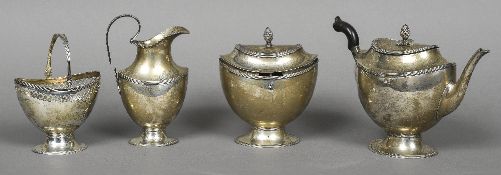 A late 18th century Dutch four piece silver tea set Comprising: teapot, cream jug,