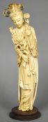 A late 19th/early 20th century Chinese carved ivory figure of Guanyin Typically worked,