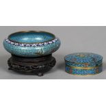 A late 19th century Chinese cloisonne bowl Of shallow form, decorated with floral sprays,