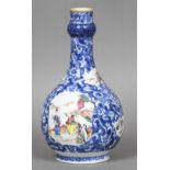 A Chinese porcelain vase Of baluster form, decorated with figural vignettes on lotus strapwork. 23.