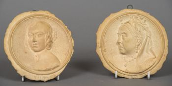 A pair of Martin Brothers pottery Royal commemorative plaques Both worked with portraits of Queen