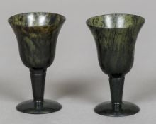 A pair of spinach jade goblets Each of flared form with a tapering stem and domed foot. Each 7.