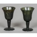 A pair of spinach jade goblets Each of flared form with a tapering stem and domed foot. Each 7.