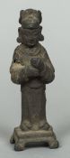 A Chinese Ming cast bronze figure of a dignitary Modelled standing wearing a headdress.