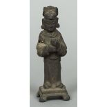 A Chinese Ming cast bronze figure of a dignitary Modelled standing wearing a headdress.