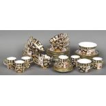 A quantity of Royal Crown Derby tea wares, pattern 2451 Comprising: six side plates, eleven saucers,