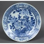 A 19th century Japanese blue and white charger Centred with birds amongst floral sprays. 37.