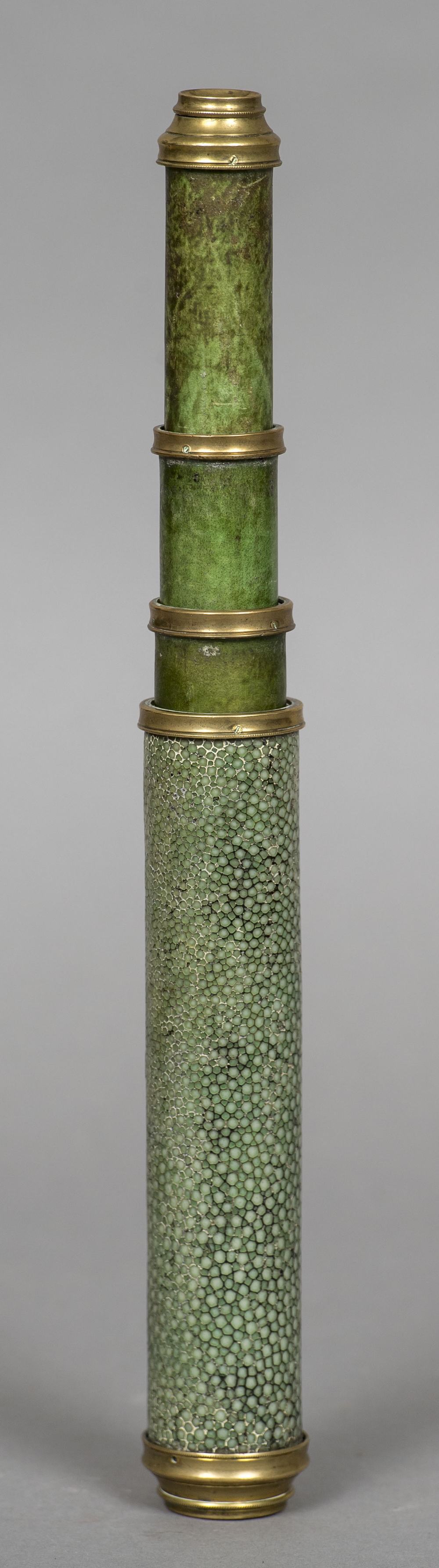 An 18th century shagreen covered brass mounted three drawer telescope 54 cm long extended.