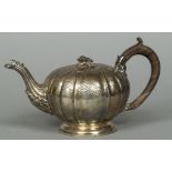A George III silver bullet teapot, hallmarked London 1819,