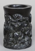 A Chinese carved zitan wood brush pot Worked with the figure of Shou Xing and two boy attendants