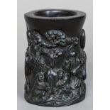 A Chinese carved zitan wood brush pot Worked with the figure of Shou Xing and two boy attendants