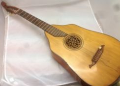 A German lute guitar Of typical construction. 102 cm long.