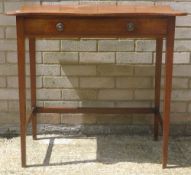 A Victorian mahogany side table with serpentine top