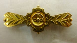 A gold brooch