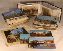 Two albums of postcards and loose cards