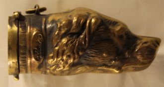 A brass dog form vesta