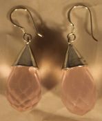 A pair of silver and rose quartz earrings