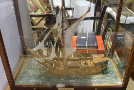 A cased scale model of H M Yacht Mary