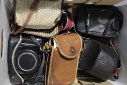 A box of various cameras