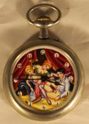 A large pocket watch with an erotic scene