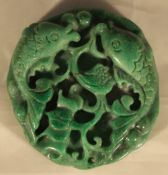 An apple-green jade pendant