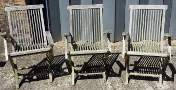 Three wooden folding garden chairs