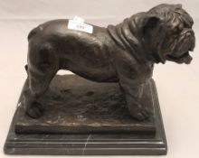 A bronze bulldog on marble base