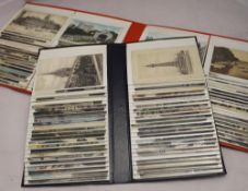 Two modern albums of 300 early 1900/1920s postally used topographical postcards