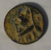 A possibly antique struck coin with Roman head