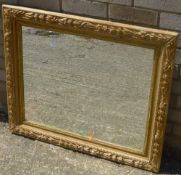 A Victorian carved pine mirror
