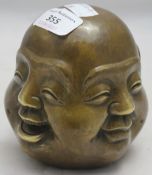 A four-face bronze Buddha