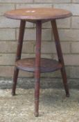 A small carved oak side table