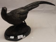 A bronze model of a pheasant