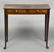 A 19th century mahogany side table The rounded rectangular top above two shallow frieze drawers,