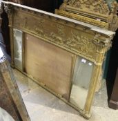 A Victorian gilt triple plate mirror