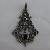 A silver Art Nouveau style pendant