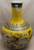 A Chinese porcelain yellow vase