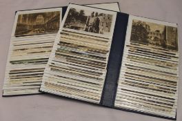 Two modern albums of 300 early 1900/1920s postally used topographical postcards of Cambridge